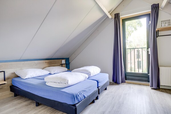 Vrijstaande 7-persoons sauna bungalow in bosrijk Ewijk, nabij Nijmegen - thumbnail 6