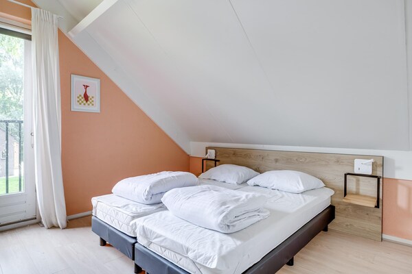 Vrijstaande sauna bungalow voor 6 personen in groen park bij Ewijk - thumbnail 6