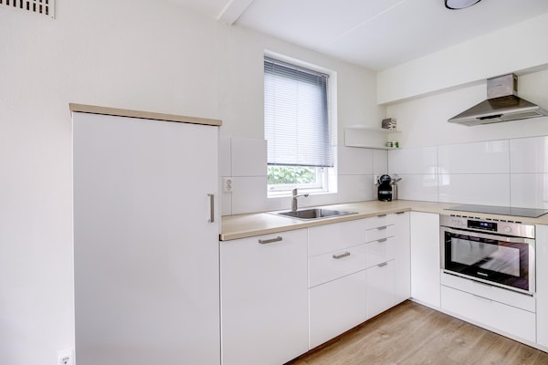 Vrijstaande sauna bungalow voor 6 personen in groen park bij Ewijk - thumbnail 5