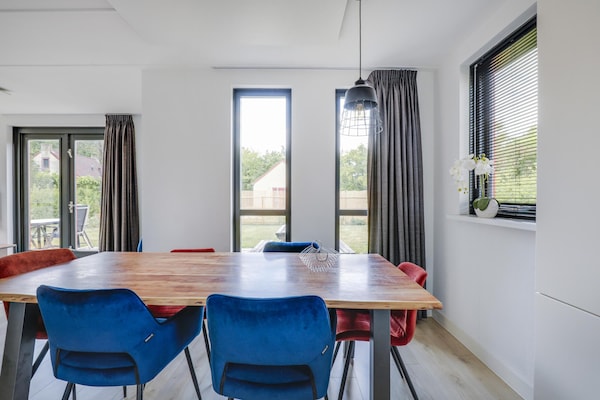 Vrijstaande boshuis met sauna aan het water in Ewijk, 6 personen - thumbnail 4