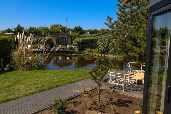 Romantisch chalet voor 2 met terras aan het water in Noordwijk - thumbnail 6