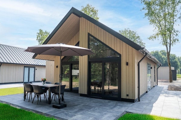 Ecovilla Boszicht Luxe: moderne vrijstaande woning met airco op Vakantiepark Latour - thumbnail 1