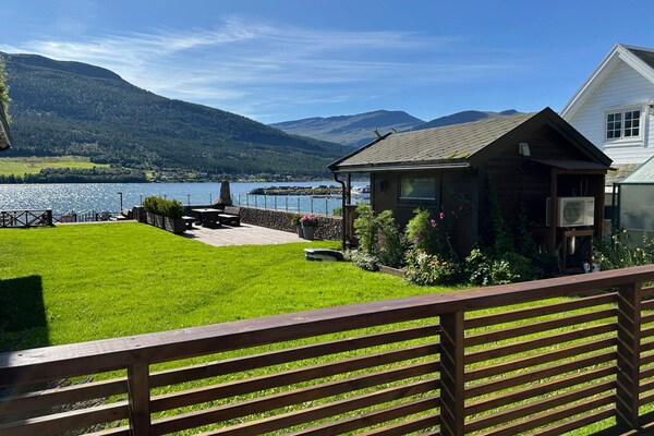 Fjordappartement in Eidsvåg met panoramisch uitzicht en gedeelde boot - thumbnail 1