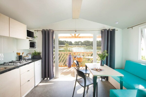 Knusse Beach Lodge aan zwemvijver met zandstrand in Ravels - thumbnail 2
