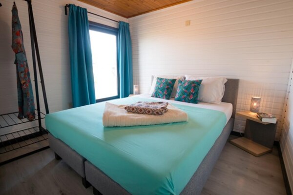 Luxe boslodge voor 4 in Ravels met tuin en zwemvijver - thumbnail 3