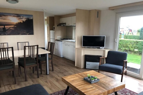 Duinchalet met vrij uitzicht op golfbaan en duinen bij Hollum, Ameland - thumbnail 3
