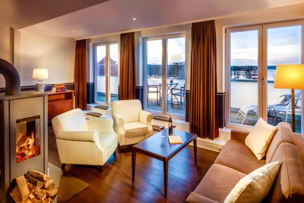 Ruime suite aan het meer met balkon en open haard in Rheinsberg - thumbnail 3