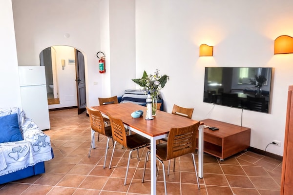 Licht appartement Il Mirto in Stintino met balkon - thumbnail 2