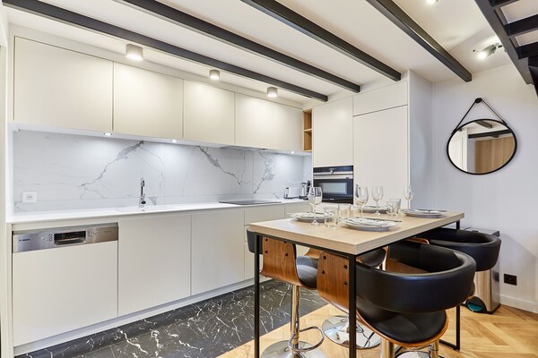 Duplex appartement met 2 badkamers in levendig hart van Parijs - thumbnail 5