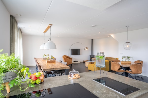 Duynweelde Texel: Luxe groepsvilla met 6 suites en ecologische zwemvijver - thumbnail 2