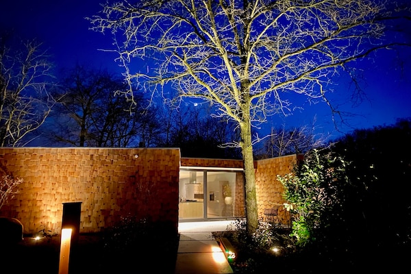 Luxe cederhouten boshuis met houtgestookte hottub op landgoed Bergvliet - thumbnail 1