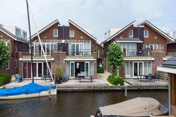 Schelpzicht: Modern appartement met privéterras aan de jachthaven van Uitgeest - thumbnail 1