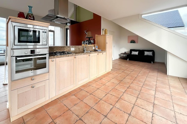 Sterrenzicht: Modern penthouse met panoramisch uitzicht over Uitgeestmeer - thumbnail 3