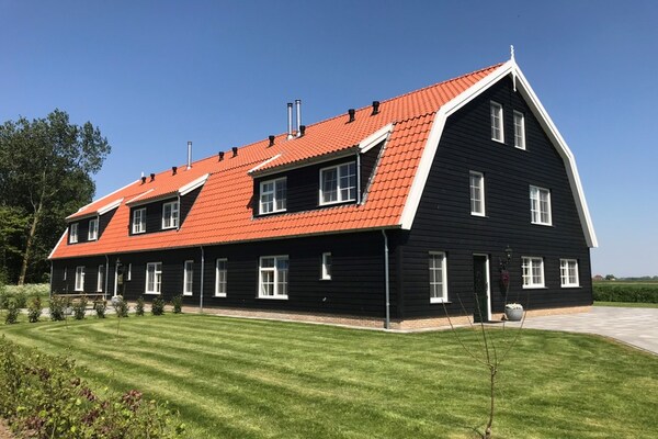 Waddenweelde Texel: Luxe groepsvilla met sauna en whirlpool op 500m² - thumbnail 1