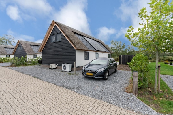 Luxe rietgedekte boerderij aan vijver met airconditioning in Baarle-Nassau - thumbnail 6