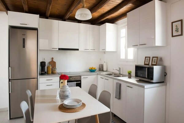Elegant appartement in Ornos met gedeeld zwembad en zeezicht - thumbnail 3