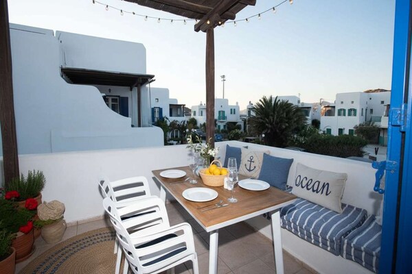 Elegant appartement in Ornos met gedeeld zwembad en zeezicht - thumbnail 5