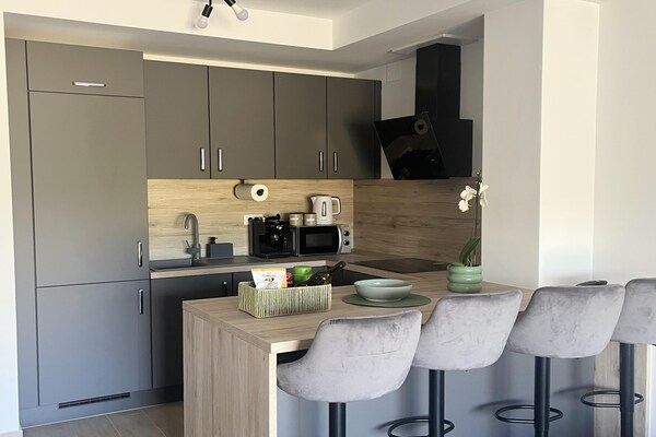 Modern appartement voor 4 met verwarmd zwembad, op 650m van strand - thumbnail 3