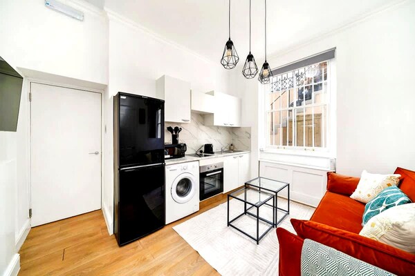 Licht appartement met privétuin op 3 minuten van metro West Kensington - thumbnail 3