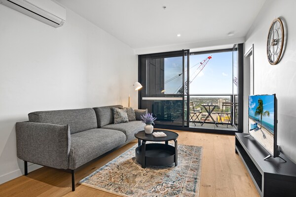 Modern appartement op de 19e verdieping met panoramisch uitzicht over Melbourne - thumbnail 1