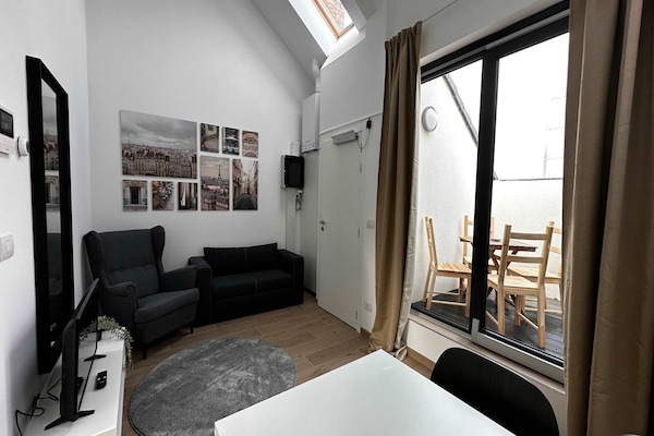 Stijlvol 1-slaapkamerappartement in de Antwerpse modewijk - thumbnail 2
