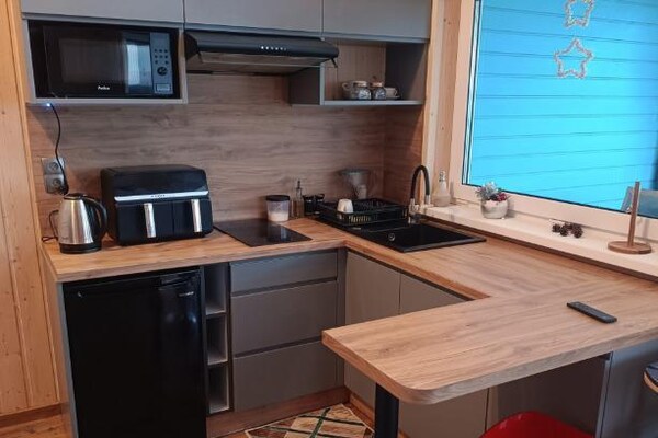 Houten vakantiehuis aan het meer met wellness en zwembad in Brzuze - thumbnail 6