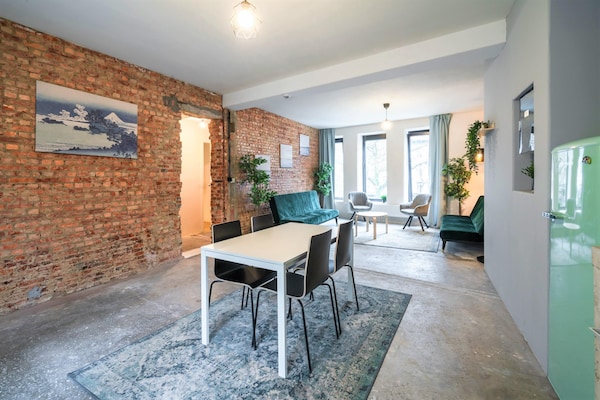 Ruim industrieel appartement met 2 slaapkamers in hartje Antwerpen - thumbnail 6