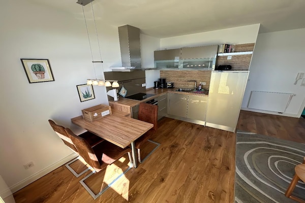 Aan zee: Modern appartement met zeezicht in Orth - thumbnail 6
