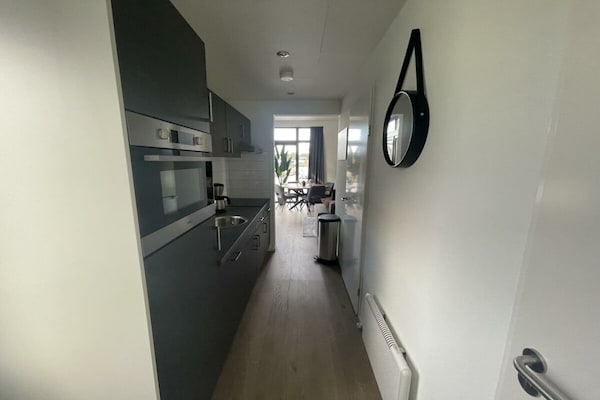 Modern chalet aan het water in Mol met 2 slaapkamers - thumbnail 4