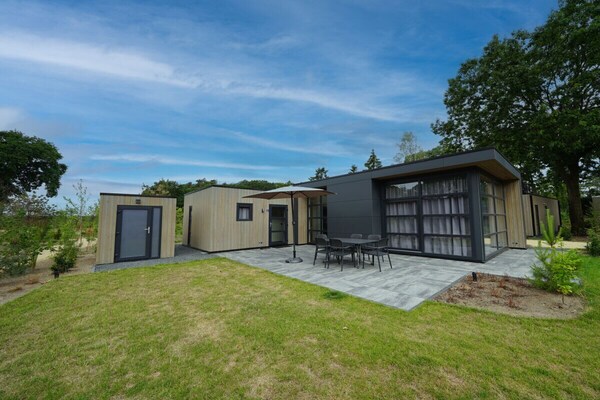 Modern L-vormig chalet voor 6 personen met tuin in Maarn - thumbnail 2