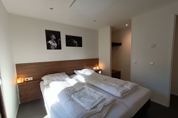 Modern L-vormig chalet voor 6 personen met tuin in Maarn - thumbnail 6