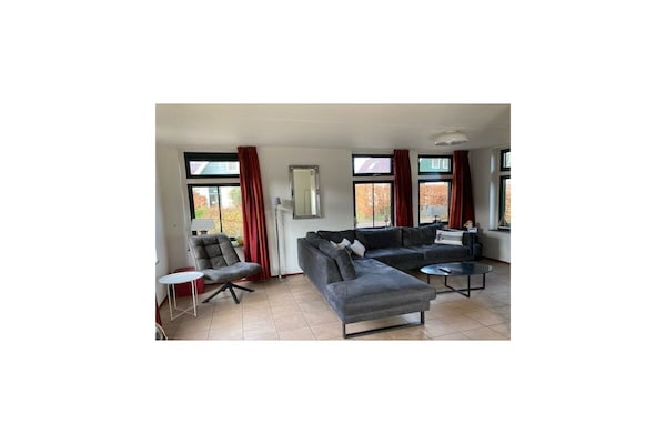 Moderne vrijstaande woning voor 6 personen met grote tuin in Schoorl - thumbnail 2