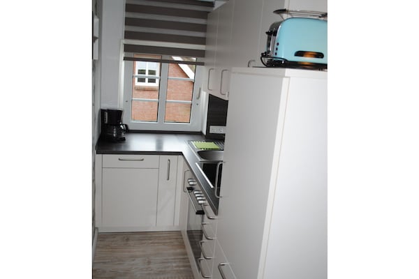Rustiek appartement in Borgsum met weids uitzicht en balkon - thumbnail 6