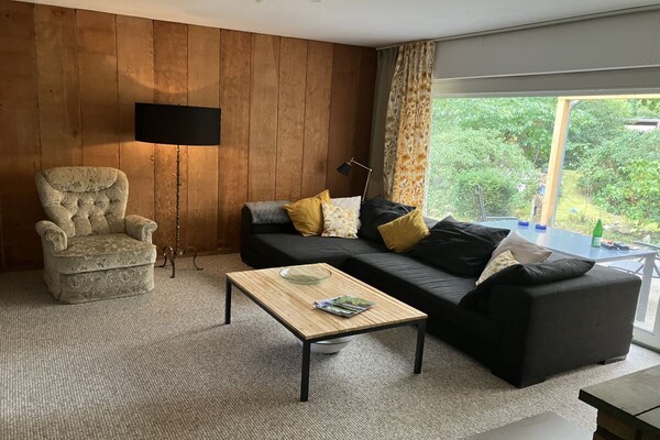 Romantische bungalow met open haard en tuin in Geeste - thumbnail 4