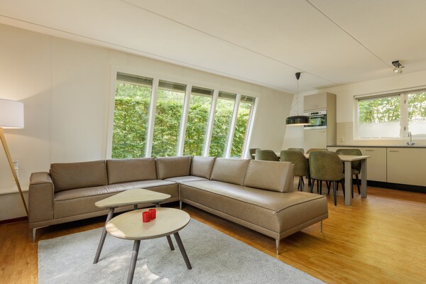 Vrijstaande bungalow voor 7 personen op de Veluwe met tuin en parkfaciliteiten - thumbnail 1
