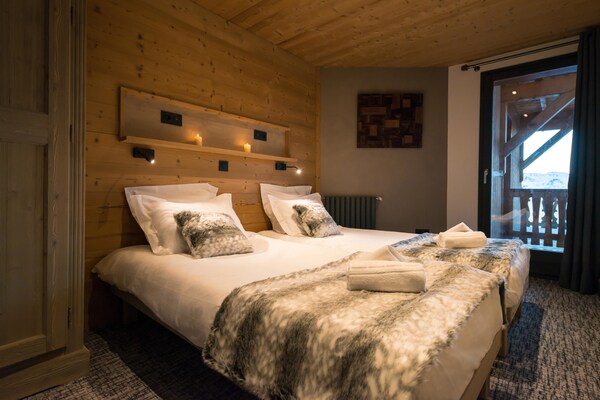 Authentiek chalet-appartement op 300m van de piste in Val Thorens - thumbnail 1