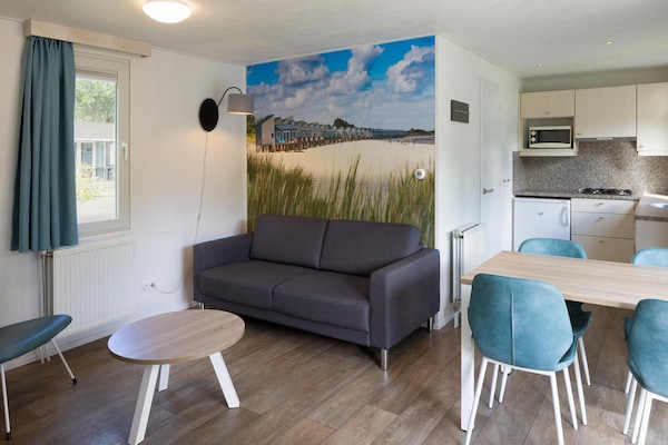 Chalet aan de kust met uitzicht op Oosterschelde en jachthaven - thumbnail 6