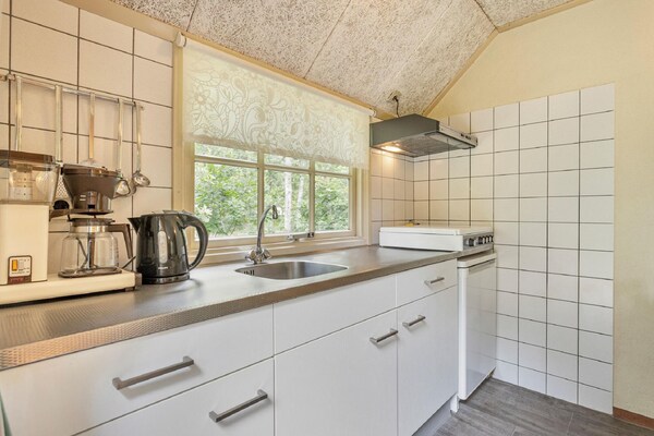 Knusse boshut voor 4 personen op Vakantiepark Herperduin - thumbnail 5