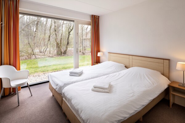 Wellnessvilla voor 8 personen in Drents natuurgebied bij Ruinen - thumbnail 6