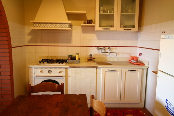 Ruim appartement in bosrijke heuvels bij Pienza met zwembad en privétuin - thumbnail 5