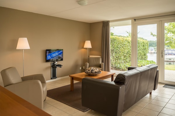 Havenwoning met uitzicht op de Maas in vakantiepark Heel - thumbnail 3