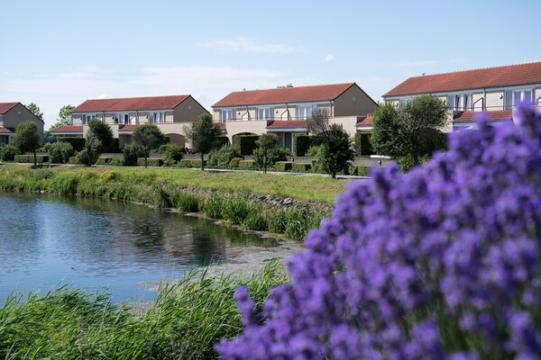 Havenwoning met uitzicht op de Maas in vakantiepark Heel - thumbnail 2