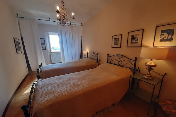 Rustiek appartement voor 4 in Montecastelli Pisano, vlakbij bos en Pavone rivier - thumbnail 4