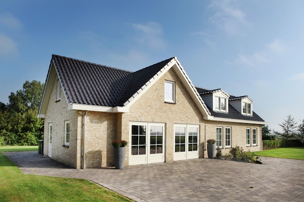 Moderne bosvilla Scoreldame: luxe vakantiehuis voor 8 personen in Schoorldam - thumbnail 1
