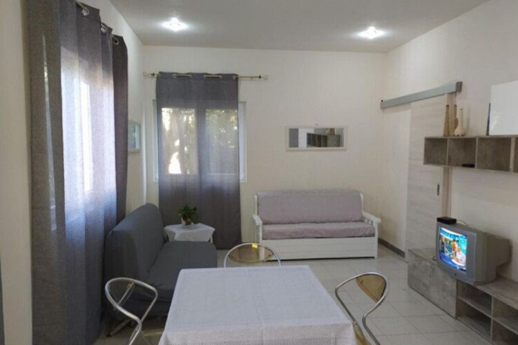 Prachtig vakantiehuis in Porto Palo met een tuin