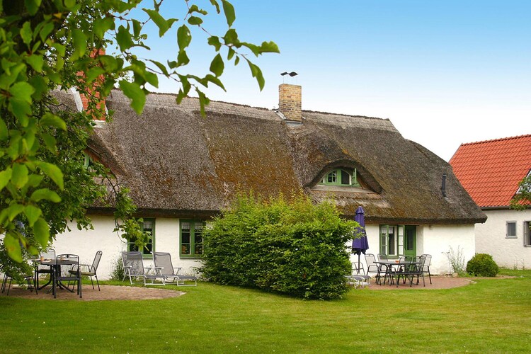 Thatched and lovingly furnished terraced houses with fireplace, WiFi and sauna in the northwest of the island of Rügen. You live in a 150-year-old and completely renovated fisherman's cottage, from whose dormer window you can see the sun rising over the Breetzer Bodden. On the 10,000 square meter garden property there is a barbecue house with three barbecue areas, a multi-purpose house with sauna, relaxation room and fitness equipment and at the end an idyllic children's playground.Vieregge, the small fishing village, is located in the most scenic part of the island of Rügen. You live quietly and close to nature on the Breetzer Bodden (approx. 400 m away), which fascinates every nature lover with its uniquely beautiful landscape between the Bodden and the sea. Here you will find peace, rare flora and fauna away from mass tourism. The morning calm is only interrupted by the swans on the bay. Wellness in the port village of Vieregge: The newly built wellness oasis in one of the thatched roof houses offers you a varied beauty and wellness program. Choose between an extensive range of massages, pampering cosmetic treatments or nurturing hand and foot treatments. The friendly staff responds individually to your needs. Highlights included: All consumption-based energy costs, bed linen and towels, WLAN, firewood, parking lot, activities nearby: Vieregge, a tranquil little fishing village, is located directly on the Breetzer Bodden in the north-west of the island of Rügen. It is part of a whole chain of Bodden waters in the Western Pomerania Lagoon Area National Park. Thousands of cranes rest here in autumn and offer a spectacular natural spectacle. The Bodden is an ideal area for all kinds of water sports and is also very popular with anglers. Only a few kilometers away from Vieregge is the Schaabe, a twelve-kilometer-long spit, which, with its fine sand, is considered one of the most beautiful bathing beaches on Rügen. Opposite Vieregge is the
About Belvilla
At Belvilla, you experience holidays exactly the way you want. Choose from an extensive range of holiday homes, apartments and caravan parks from Europe to Florida. From a cabin by the Norwegian fjord to an exclusive villa on the Côte d'Azur, and from an apartment in Rome to a country estate in Tuscany. At Belvilla you will find the perfect holiday home for an unforgettable time with your family, partner or friends. You will also find holiday homes for larger groups, spread across various regions in Europe.
Belvilla offers a wide variety of holiday homes: small and cosy with a sauna or spacious with an outdoor pool, roof terrace and numerous bedrooms. At Belvilla, for example, you can choose from holiday homes in prime locations, with luxury amenities and homes particularly suitable for families. Of course, many holiday homes also have a space reserved for your dog. You can choose from practical holiday homes in popular holiday destinations, city houses in cosmopolitan cities such as Venice or Rome, dreamy holiday homes in top locations and spacious holiday homes with unique furnishings. Besides holiday homes by the sea, Belvilla also offers holiday homes with swimming pool and/or wellness facilities.