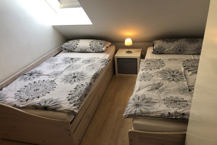 On the 1st floor: (Living room(TV(cable, satellite), dining table, radio, CD player), Kitchenette(hob(ceramic), coffee machine, microwave, fridge-freezer), bedroom(2x single bed), bathroom(shower, washbasin, toilet, hairdryer))\n\nAttic: (bedroom(double bed))\n\nbalcony, parking