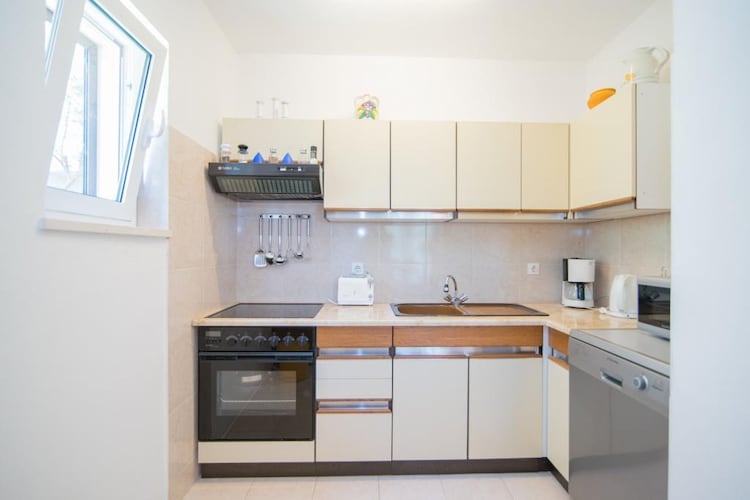 Apartments Paco are located on the Island of Brač, a quiet Island with rich cultural and historical heritage, beautiful beaches and scenery, just 17 km away from the Split.
Property features two units, both featuring equipped kitchen and a private bathroom. A perfect touch for a relaxing vacation is a furnished terrace overlooking the sea in each unit.
Luggage storage is possible prior to check in and after check out.
Pets are allowed on request with an additional charge.
Free private parking is possible on site, reservation is not needed.
Situated on the ground floor, with furnished terrace overlooking the sea, this is a great place to spend enjoyable vacation. WiFi and a SAT TV are provided. Kitchen is fully equipped featuring oven, stove, water kettle, dishwasher, microwave, coffee machine and kitchenware. Bathroom is private with shower and hair dryer. Washing machine is at the guests disposal.
This is a lovely two bedroom apartment can comfortably accommodate up to four people.
Apartments Paco are located in center of Postira.
Anything you may need for a lovely vacation is within walking distance. Coffee bars, restaurants, market, bus stop, post office, tourist info, ambulance and pharmacy and everything you may need is in the radius of 300 meters. The nearest beach is just 200 meters from the apartment. Bank, gas station and ferry port are 10 km away.
Ferry port is 10.9 kilometers distance from the property and airport of Brač is 20 kilometers away.