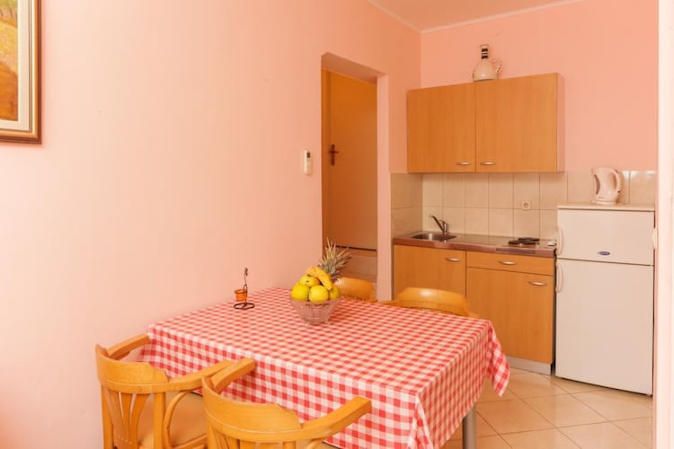 Apartments Villa Dubrovnik feature set of accommodation units located in Cavtat, a quiet little town 20 min ride from Dubrovnik Old Town.

Private parking free of charge, available on site.
Baby cot available upon request.

This lovely superior studio apartment with terrace can comfortably accommodate up to 4 persons.
It features one double bed and sofa that can be converted into bed for two. Further this studio is equipped with air conditioning, free WiFi and SAT TV. The kitchen is fully equipped and comes with dining and seating area.The terrace has a sitting corner and a lovely sea view.
Guests will have access to shared washing machine.

This location is perfect for guests who love to enjoy the sun and the sea, being close to Dubrovnik, but far enough to avoid the crowds and keep their peace and privacy. Apartment is located only 17 minutes walk to the nearest beach. Various restaurants, bars and shops can be found on the famous seaside promenade, ideal for those who enjoy the nature and long sunset walks. Grocery store and bakery can be reached within 900 meters. Old Town of Dubrovnik is 15,5 km away. Nearest bus stop is in  meters range of the property.

Dubrovnik's main bus station and ferry port, connecting the mainland with various Dalmatian islands, are 18 km away, while Dubrovnik Airport is 4.2 km away.