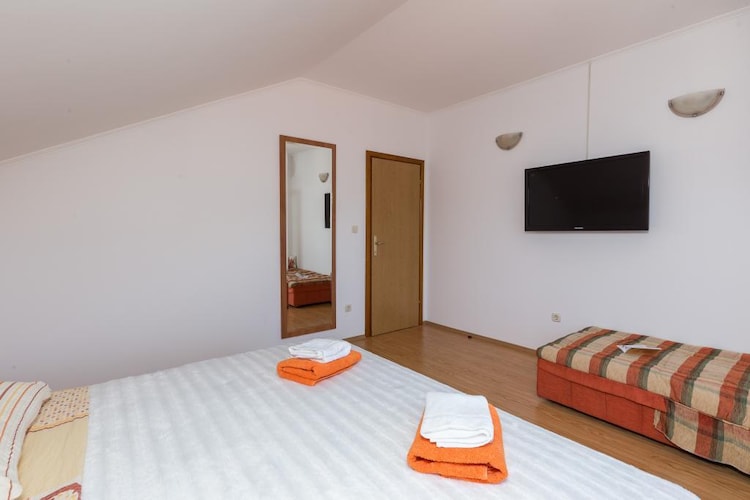 Apartments Memunić - Comfort One Bedroom Apartment with Balcony and Sea View (VELIKI)-Slaapkamer
